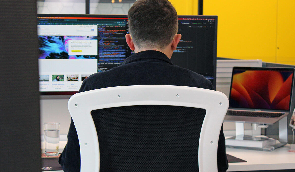 Man working on a computer in an office