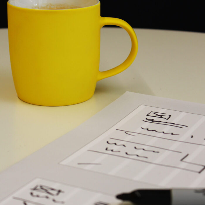 a coffee mug and notepad