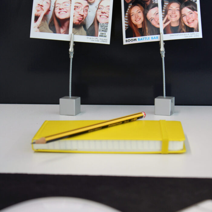notepad and pictures on desk